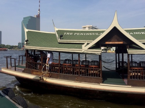 This lovely wooden boat will take you across the river